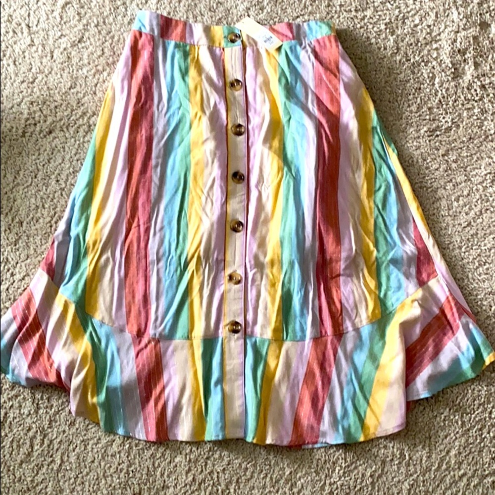 NWT skirt. Metallic and pastel with button detail.